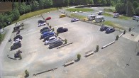 Archiv Foto Webcam Willingen: Auslauf der Mühlenkopfschanze und Zuschauerbereich 13:00