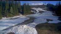 Archived image Webcam Riesneralm - Donnersbachwald: Slope 6er Schuss and chairlift Panorama 19:00