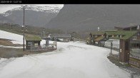 Archived image Webcam Myrkdalen Hotel at base station chair lift Myrkdalsekspressen 13:00