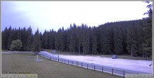 Archived image Webcam Pokljuka: Biathlon Stadium Entrance 19:00