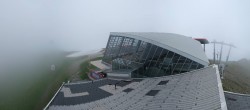 Archived image Webcam Axamer Lizum: Hoadl-Haus und Top station Olympiabahn 13:00