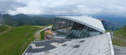Archived image Webcam Axamer Lizum: Hoadl-Haus und Top station Olympiabahn 11:00