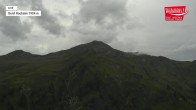 Archived image Webcam Wildkogel Ski Resort - Panorama restaurant at 2100m 13:00