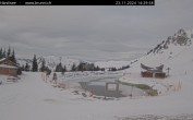 Archived image Webcam Engelberg: Lake Härzlisee & mountain restaurant Kräuterhütte 13:00