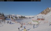 Archived image Webcam Engelberg: Lake Härzlisee & mountain restaurant Kräuterhütte 11:00