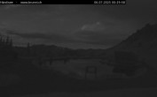 Archived image Webcam Engelberg: Lake Härzlisee & mountain restaurant Kräuterhütte 23:00