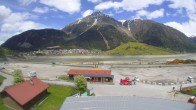 Archiv Foto Webcam Schöneben: Talstation der Bergbahn mit Blick auf Reschensee und Dorf Reschen 13:00