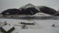 Archiv Foto Webcam Schöneben: Talstation der Bergbahn mit Blick auf Reschensee und Dorf Reschen 11:00