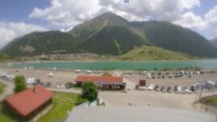 Archiv Foto Webcam Schöneben: Talstation der Bergbahn mit Blick auf Reschensee und Dorf Reschen 11:00