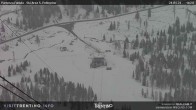 Archived image Webcam Fassatal - San Pelegrino - panorama view of the ski-piste and liftmachinery of the "San Pellegrino Pass" 13:00