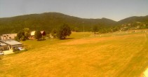 Archived image Webcam Autrans village: parking place 13:00