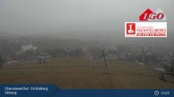 Archived image Webcam Oberwiesenthal - Fichtelberg ski slope 12:00